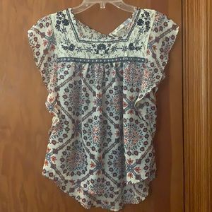 Jolt short sleeve top with keyhole back.